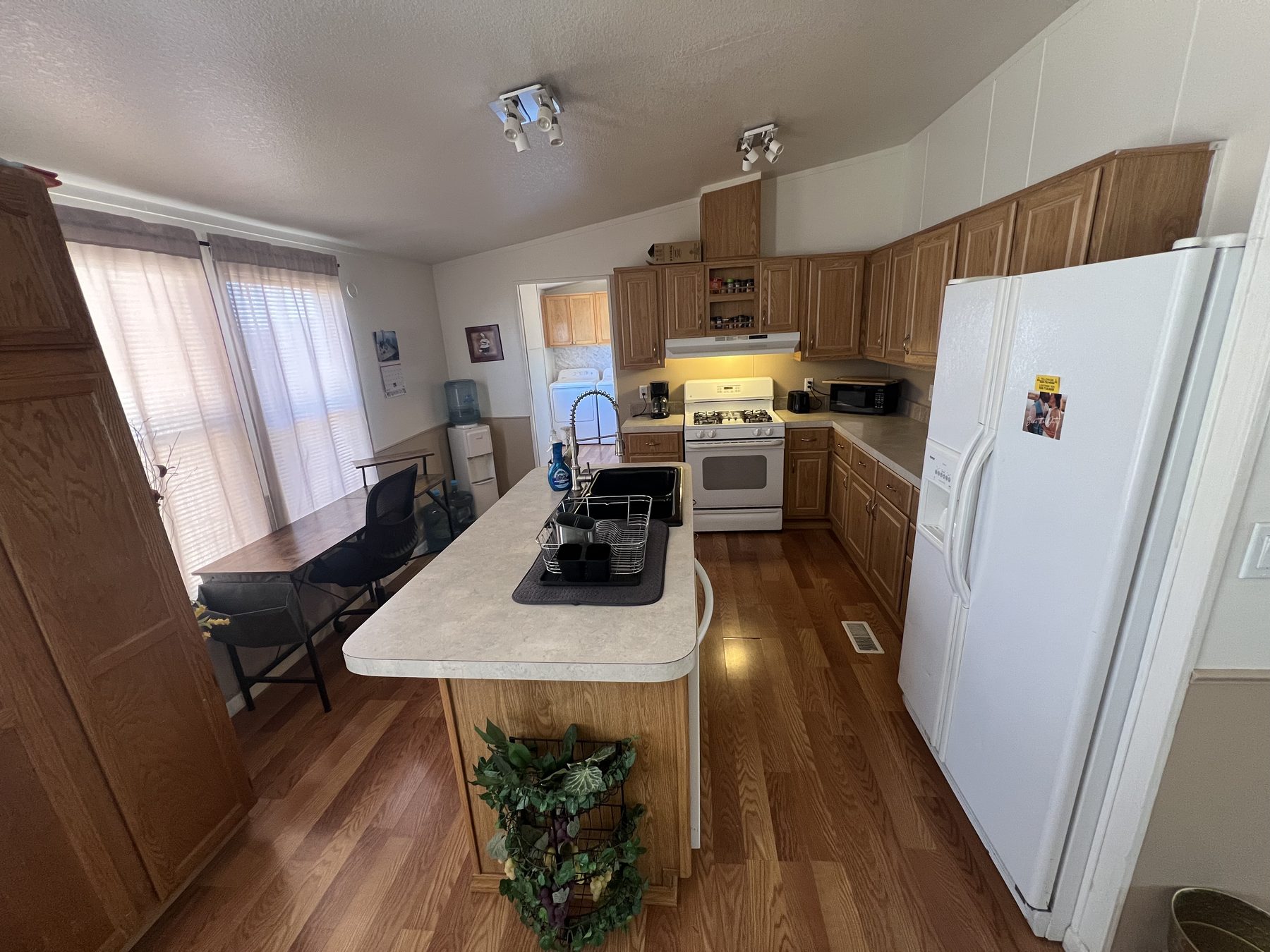 Kitchen with island and dining nook