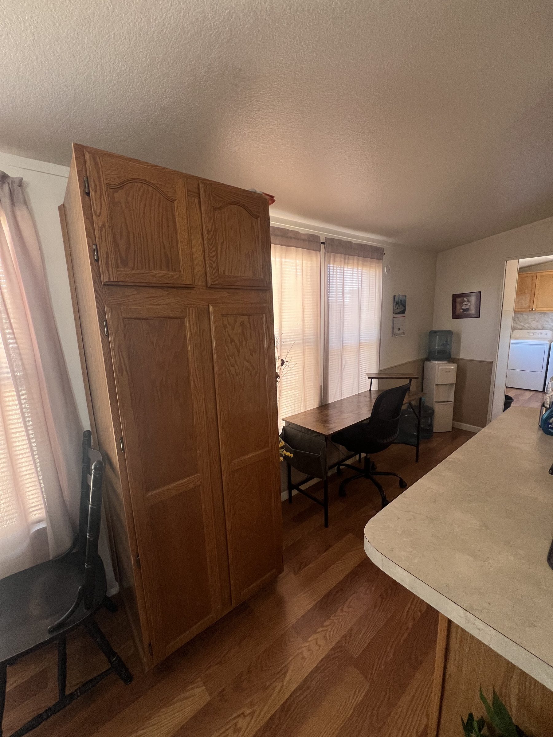 Workspace nook with laundry access